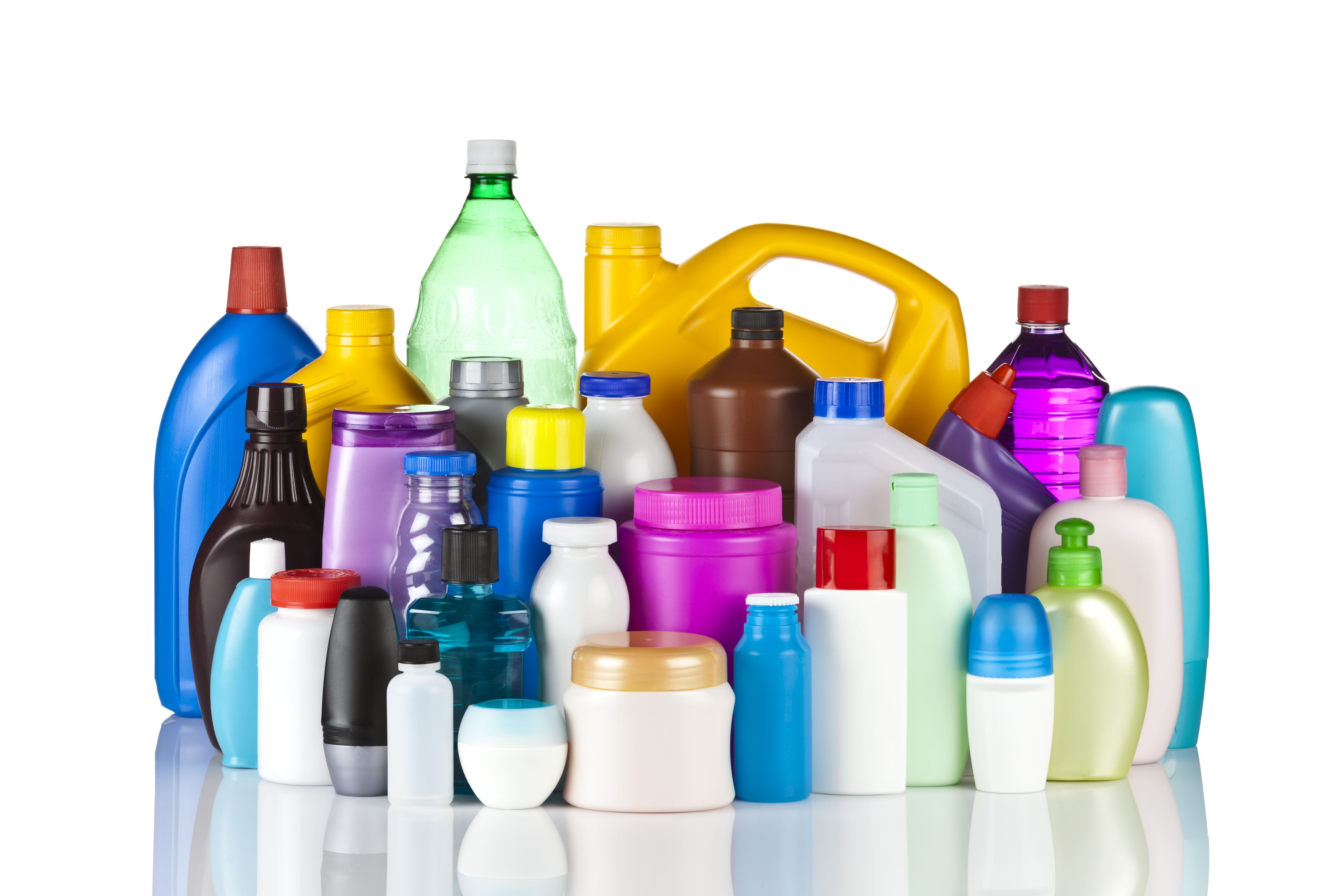 A large group of multicolored plastic bottles and containers 