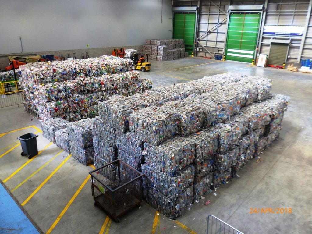 Recyclables baled and waiting to go to re-processor